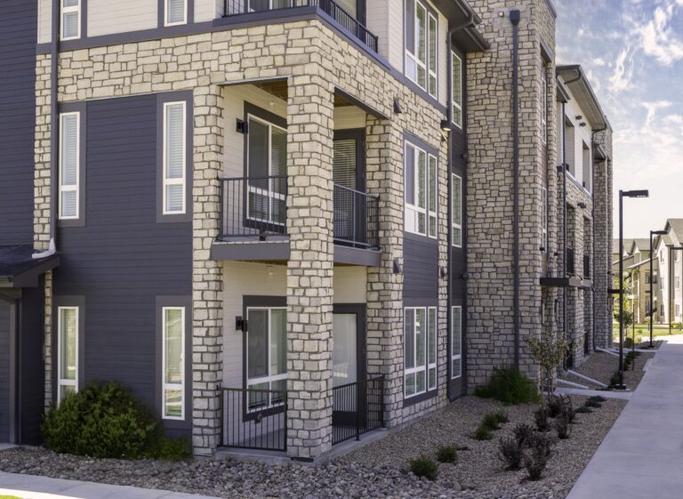 cobble ash stone veneer commercial apartment building